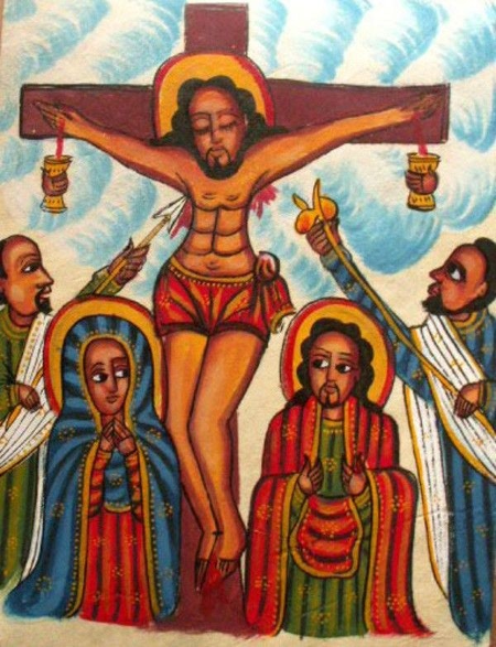 A colourful painting of jesus on the cross.