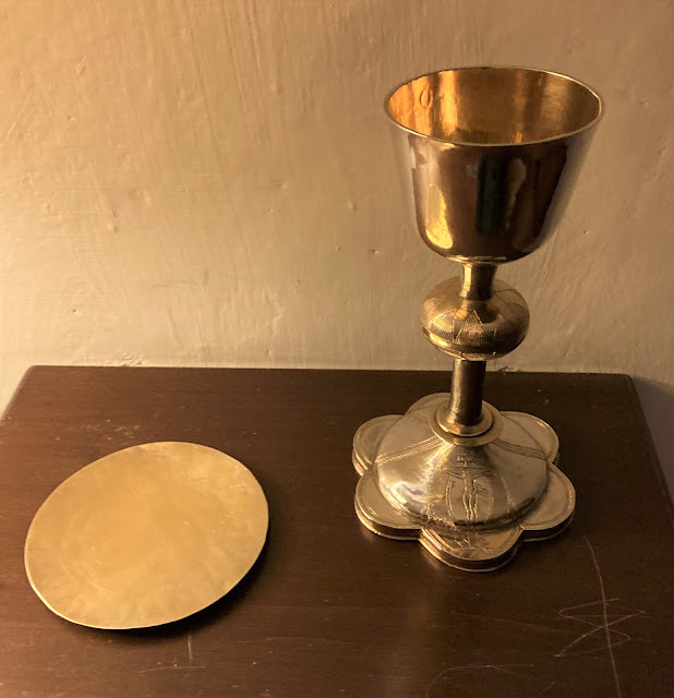 A historic chalice and paten.