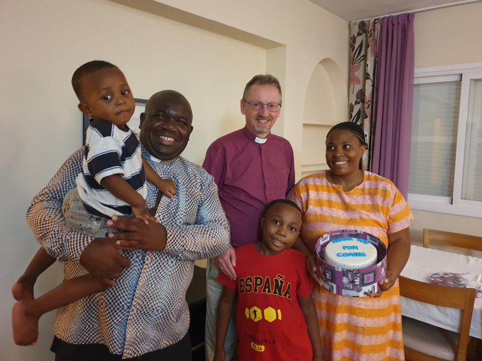 Bishop Robert, The Very Revd. Dr. Ishanesu Gusha, his wife Caroline and two of their three young sons.