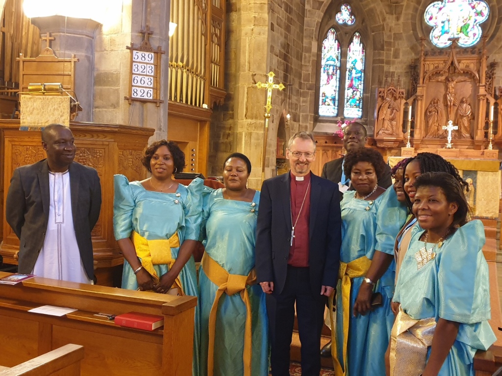 Bishop Robert with the community of Luganda-speaking Bugandans