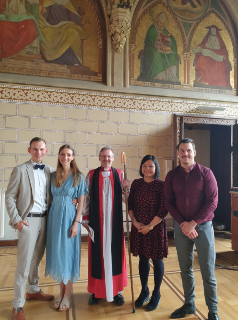 Bishop Robert with four confirmation candidates.