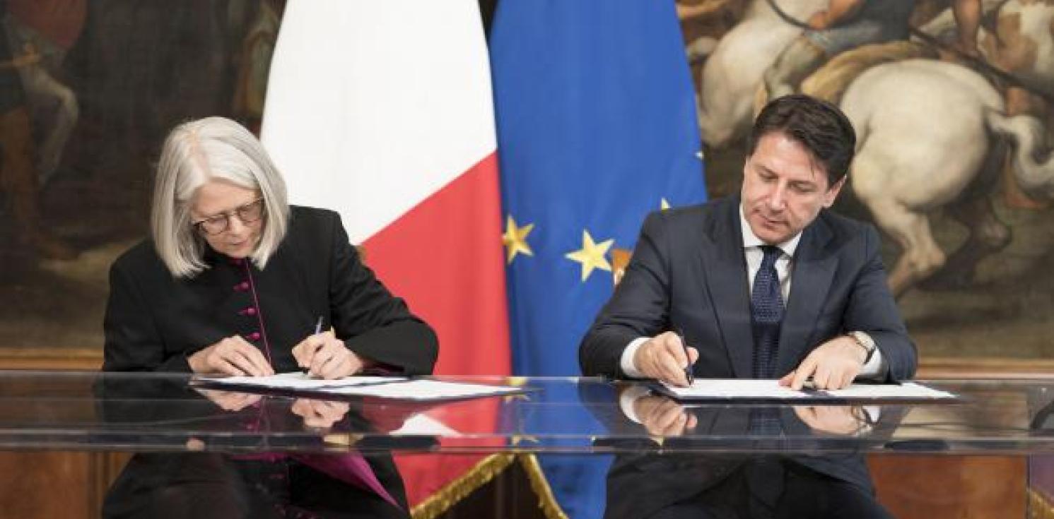 Italian Prime Minister signs Treaty with Church of England.