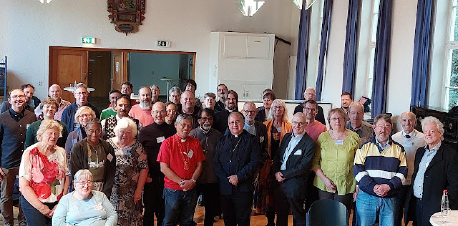 Clergy and lay synod delegates from the Diocese.
