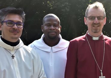 Bishop Justin with two Ordained members of clergy.