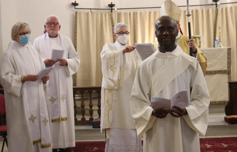 Father Solomon Ike being ordained.