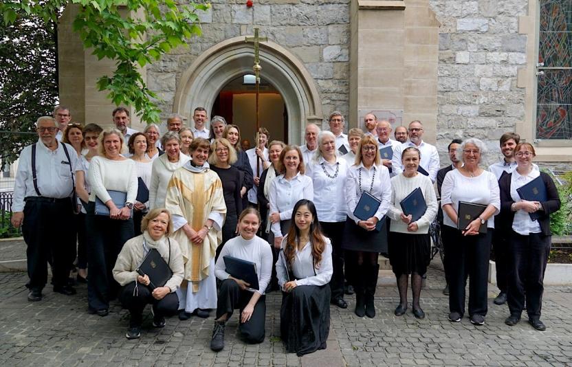 A choir outside a church