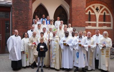 Clergy gathered after Chrism Eucharist.
