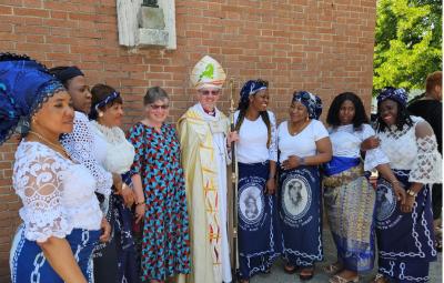 Bishop Robert and Mothers Union representatives in a row