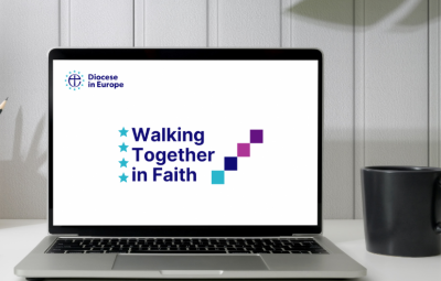 wtf logo on an open laptop on a desk